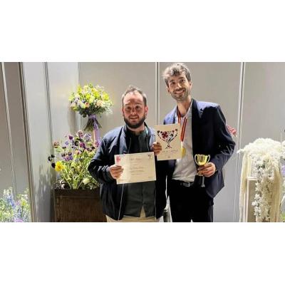 Sello tafallés en un arte floral de premio